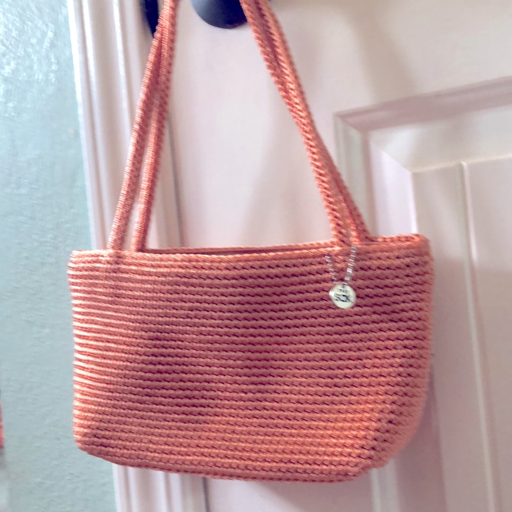 The sak - peach purse, small (one inside zipper pocket) beautifully crocheted